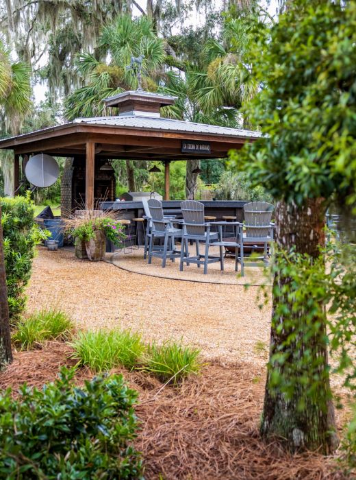 Outdoor cooking area and fire pit at the lodge at Dorchester Shooting Preserve in Midway, Georgia